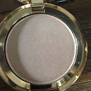 BECCA Light Chaser Highlighter for face & eyes